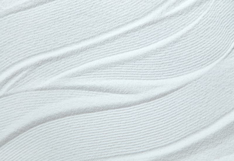 Bazi Ausbildung – ruhige, minimalistische Sandstruktur als Symbol für das Fundament der Bazi Wisdom Academy®